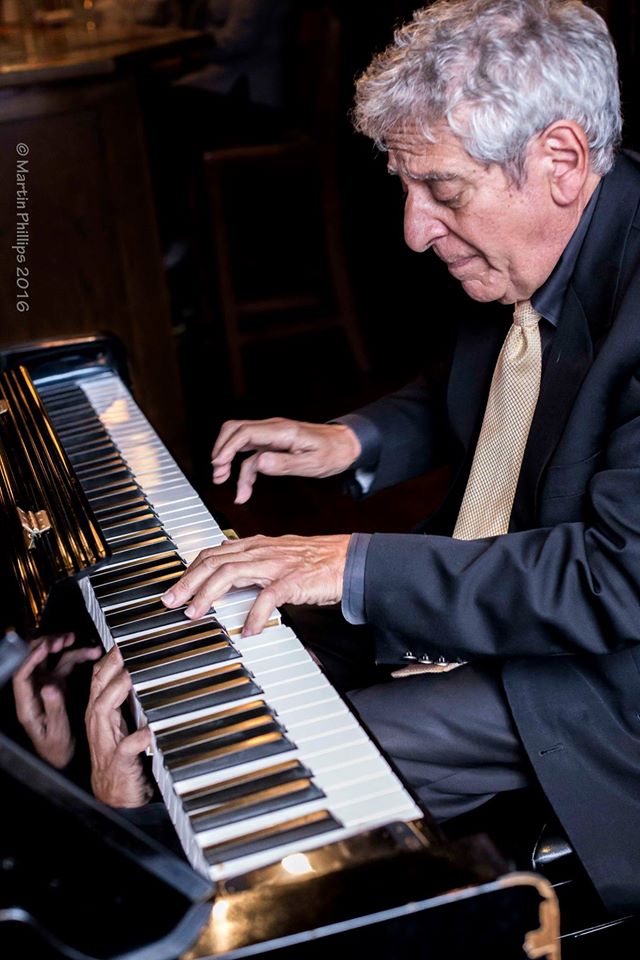 Bob Bennetta playing piano